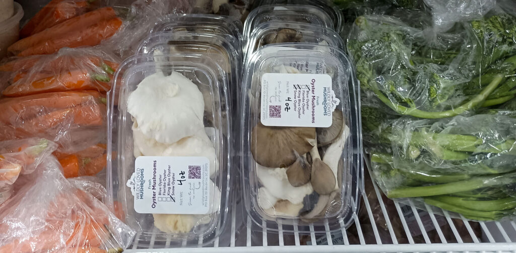 Mushroom packages in store cooler